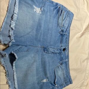 Women’s size 14 light denim distressed shorts.